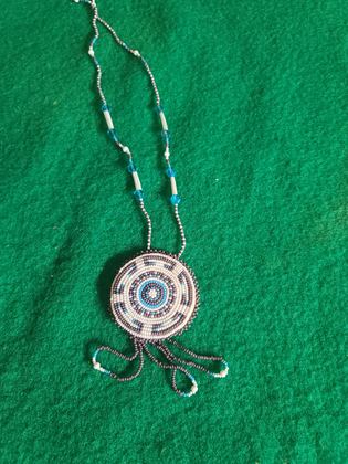 Beaded medallion necklace with lavender and turquoise concentric rosette, plate 122