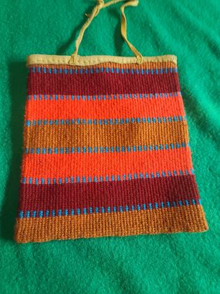 Plateau twined wool-yarn flat bag, banded design, hide-bound top, plate 20