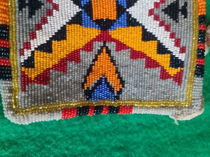 Fully-beaded geometric flat purse with beaded carrying strap, plate 62